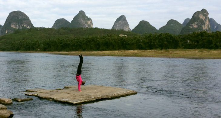 handstand by the river